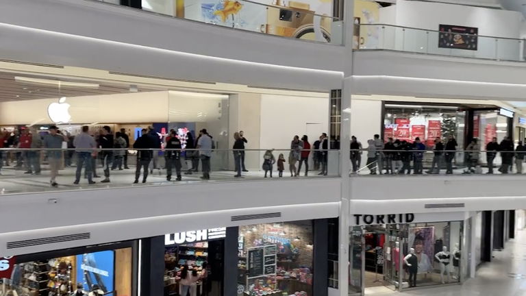 Mile-long queues to enter the new Apple Store at a New Jersey mall