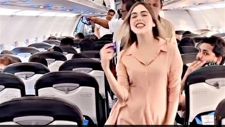 A young woman does an innocent dance on a plane  and the whole internet is on her